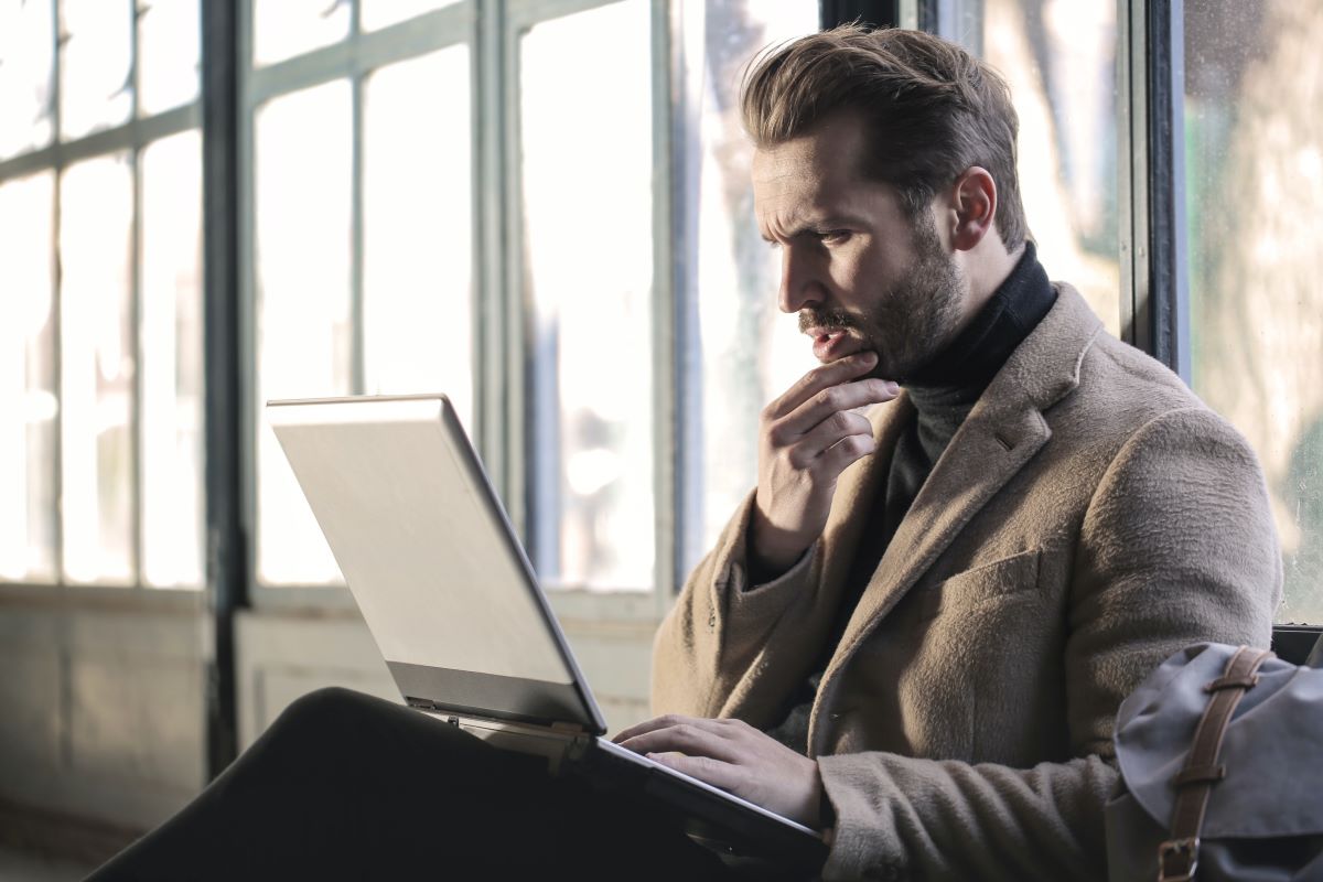 Businessman looking at laptop