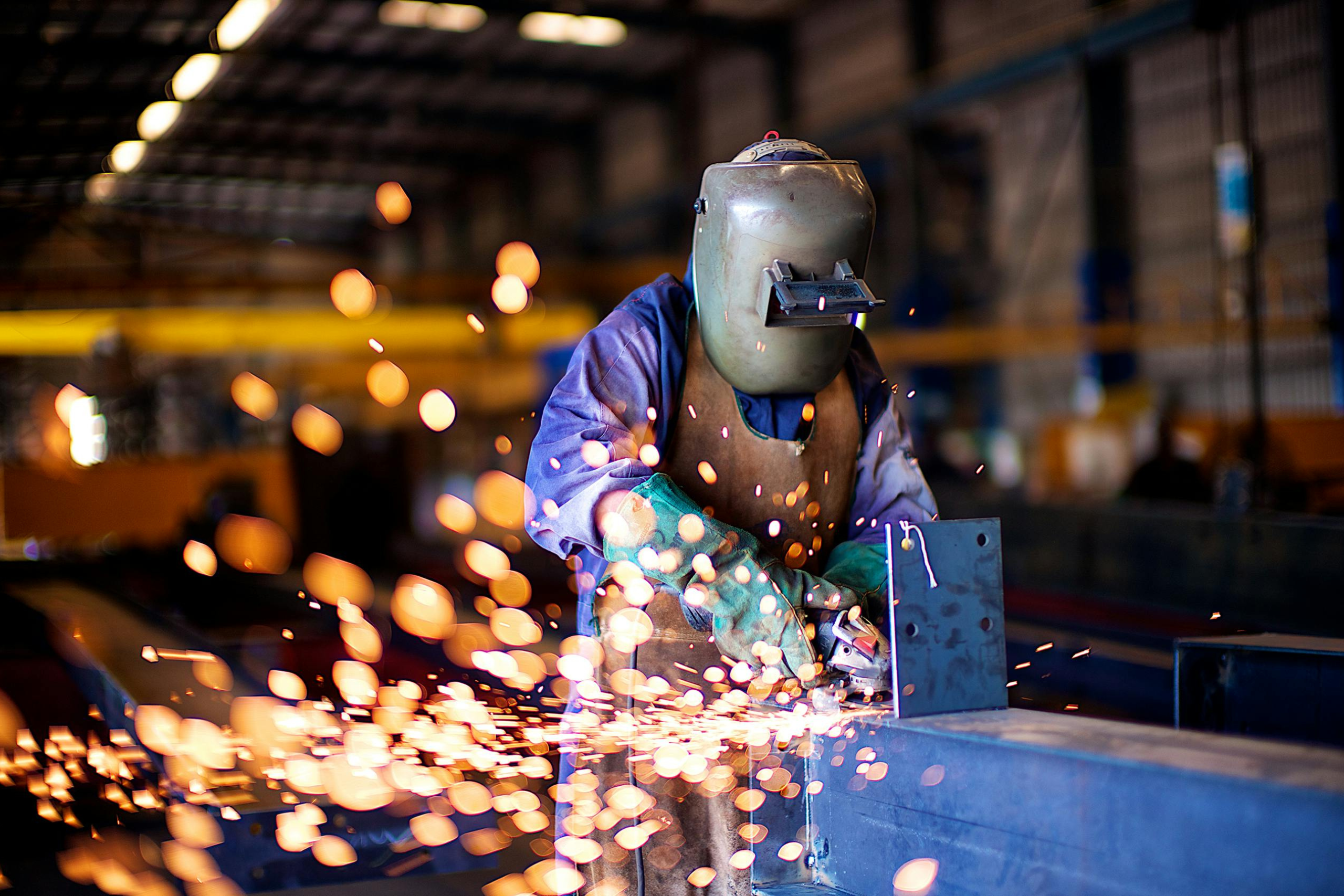 Welder working on project.